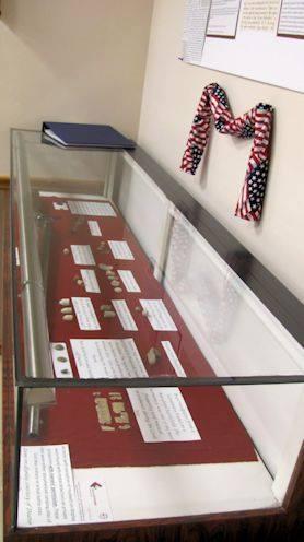 Display of bullets and information of fire company militia units that responded to Harper's Ferry 